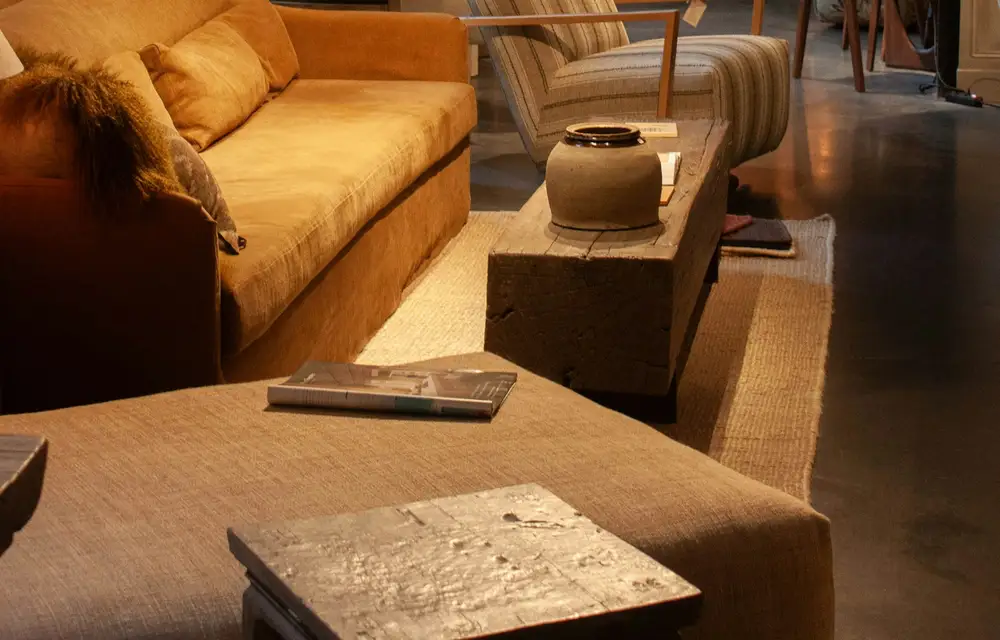A furniture showroom interior lit with warm lamps